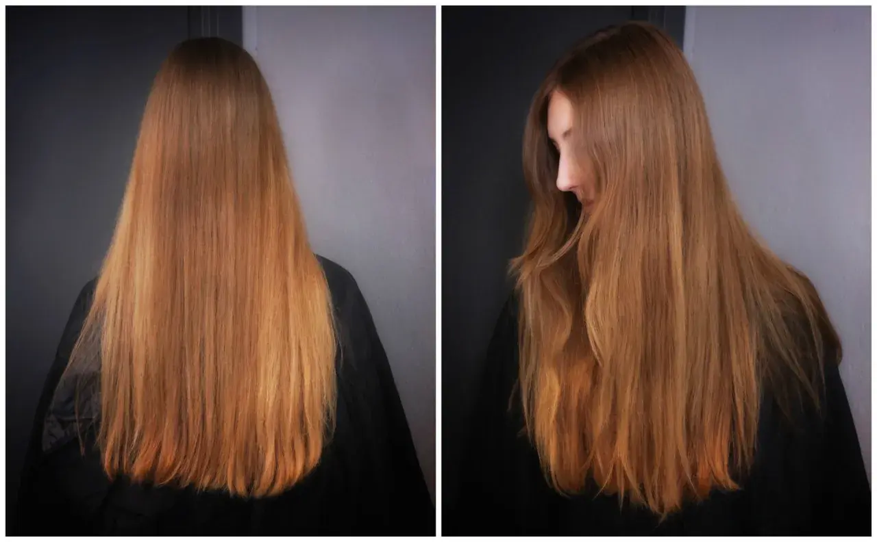 Långt, askblondt hår med orange toner som faller över axlarna.